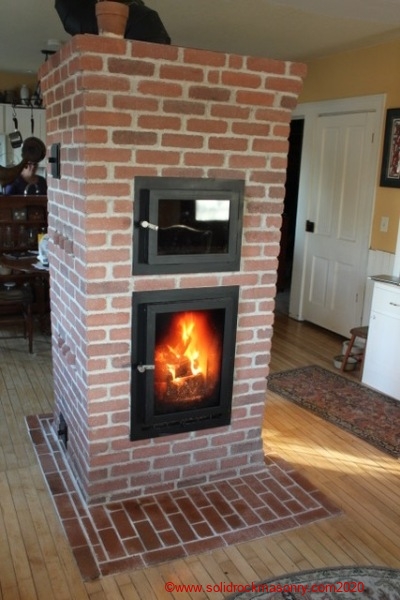 SR-13-small-masonry-heater-finished-with-brick-by-client