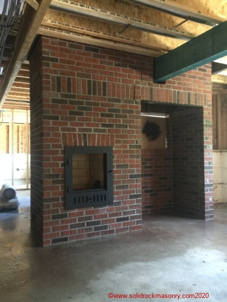 SR-22-brick-masonry-heater-with-large-wood-box