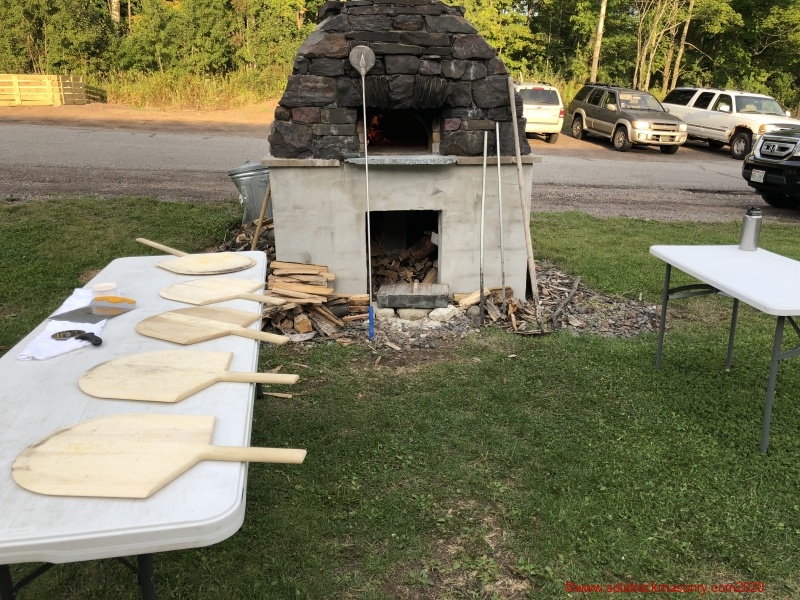 1_Preparation-for-baking-pizzas-in-a-wood-fired-oven