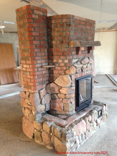Granite-and-brick masonry heater