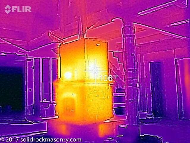 Thermal picture of a masonry heater showing the radiant heat